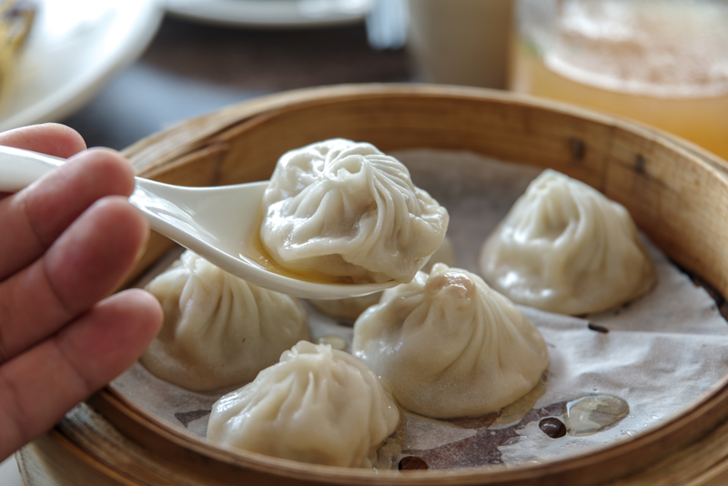 Illustration for article titled The correct way to eat xiao long bao, the world's most magnificent soup dumplings
